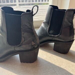 Well worn black Ankle Boots